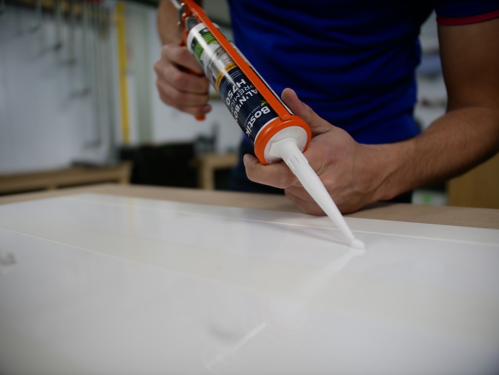 IKEA play kitchen hack apply adhesive
