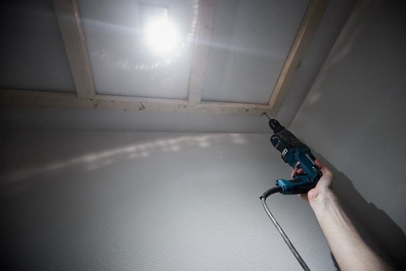 Mounting the frame to toilet ceiling