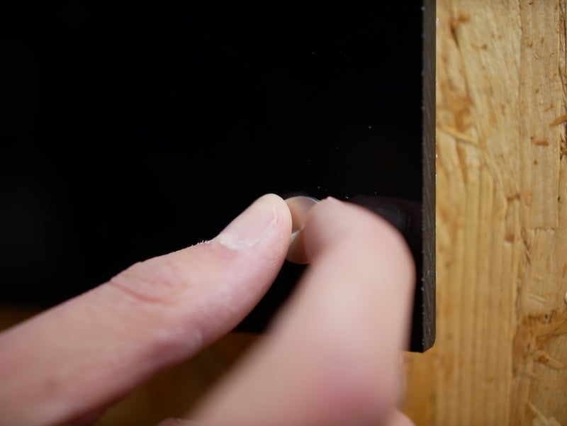 attaching spacers to acrylic sheet