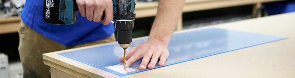 drilling polycarbonate banner