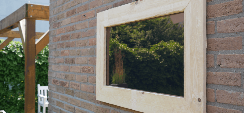 Garden mirror hanging