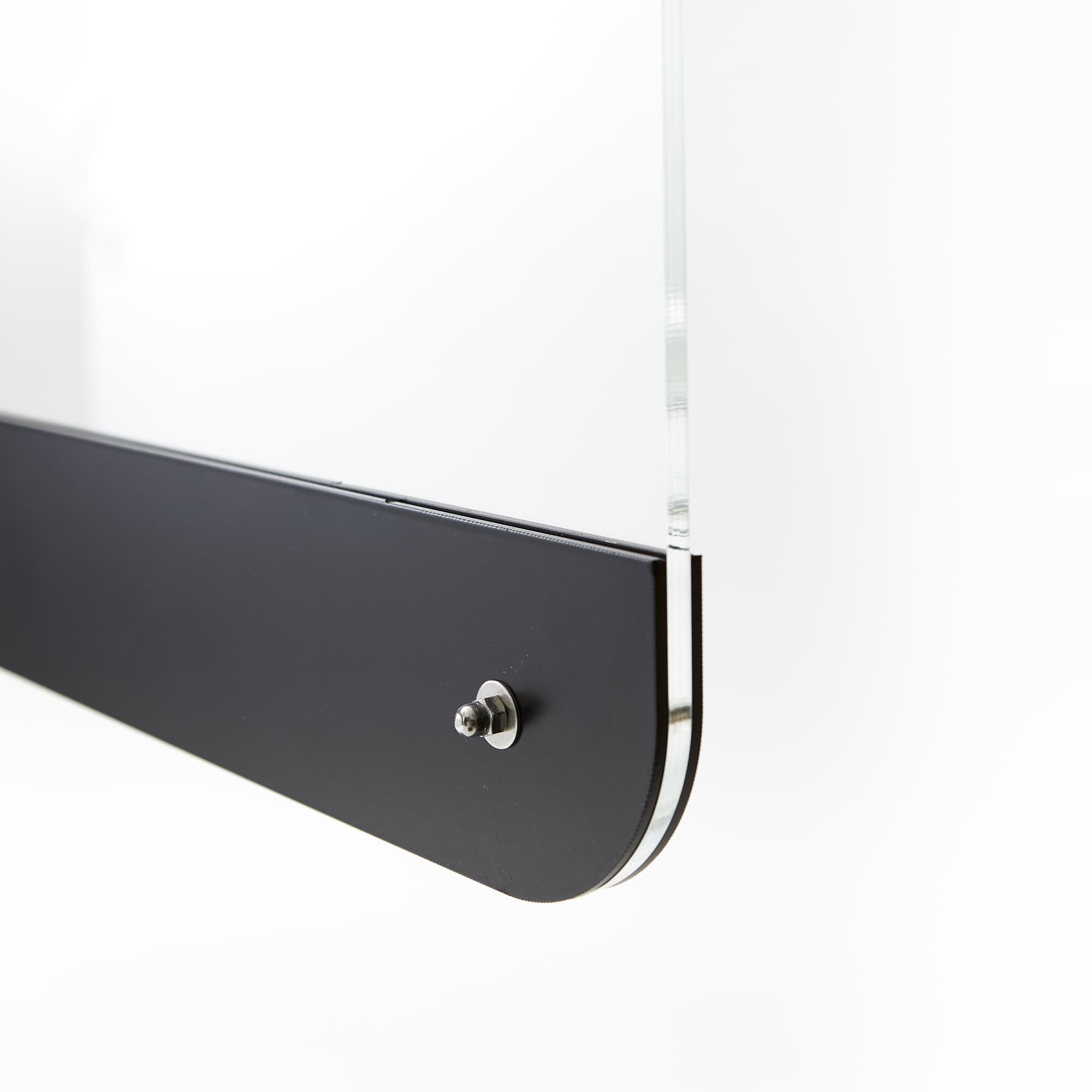 Perspex screen mounted on steel base