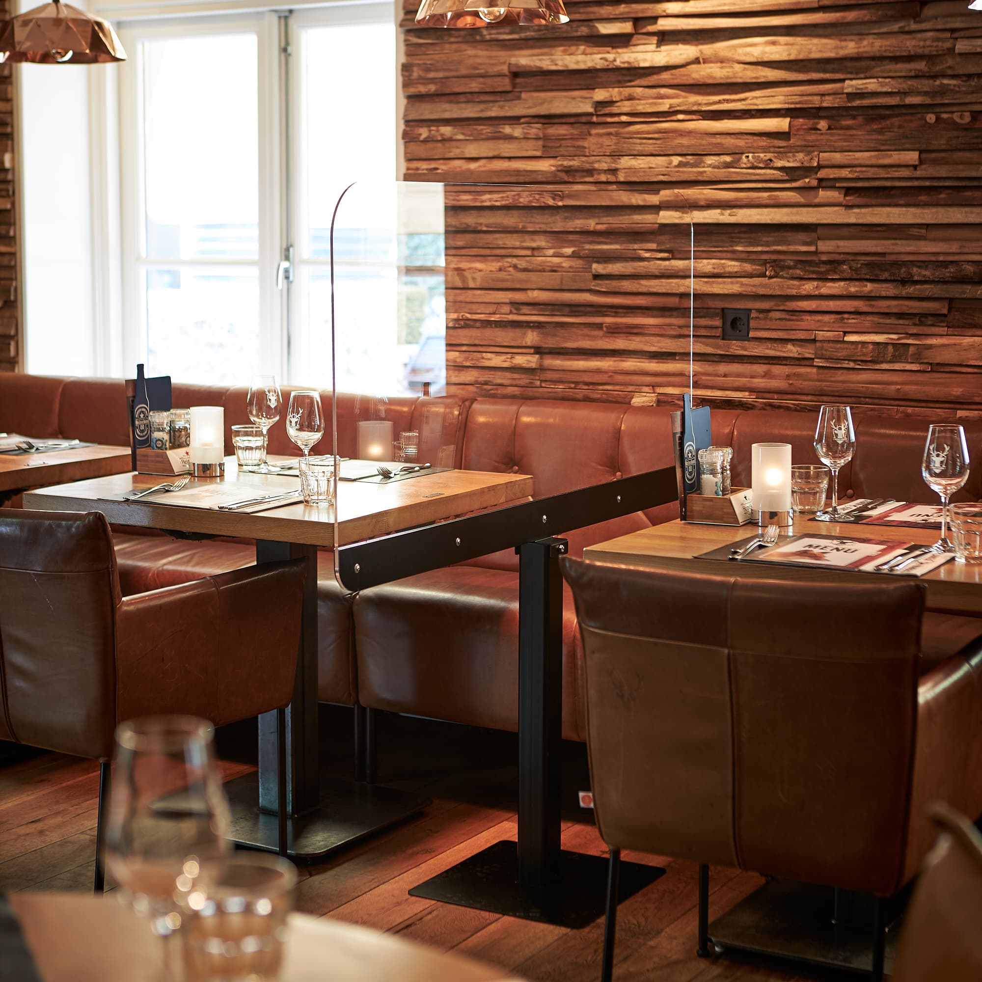 Perspex screen on a base in catering establishment
