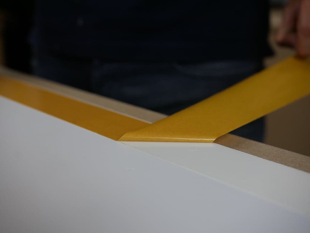 Remove protective film of the tape