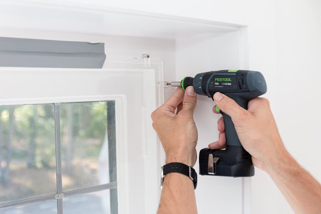 DIY Secondary Glazing - screwing glazing clips